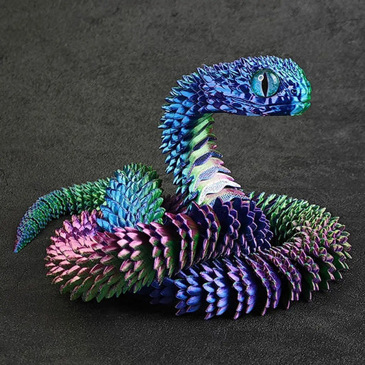 Colorful snake sculpture on a dark background