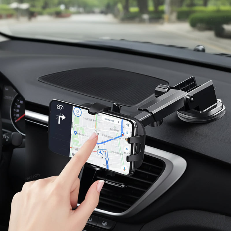 Car phone holder with a smartphone displaying a navigation app, placed on a car dashboard.