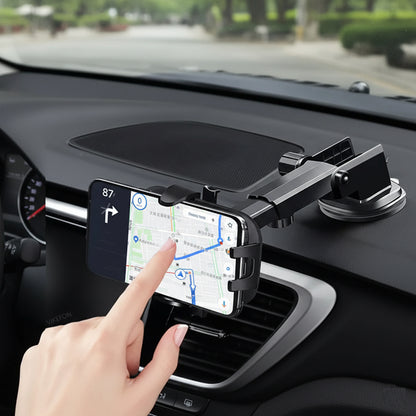 Car phone holder with a smartphone displaying a navigation app, placed on a car dashboard.