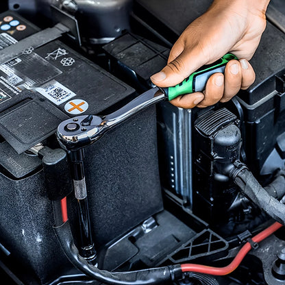 Person using a ratchet wrench on a car battery