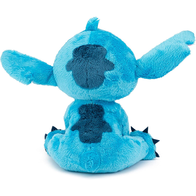 Blue plush toy with black accents on a white background