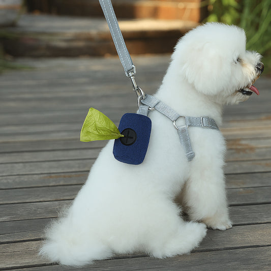 White Dog with dog poop bag