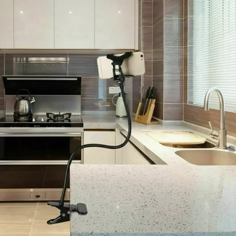 Kitchen with a smartphone on a stand, mounted on a kitchen counter.