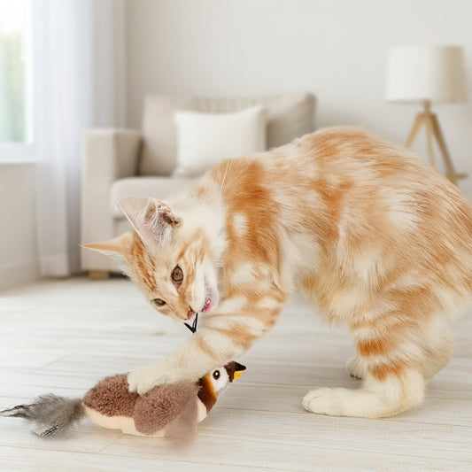 Cat playing with a toy on a light-colored floor.
