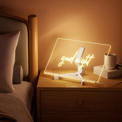 Neon sign with 'good night' on a bedside table in a bedroom setting