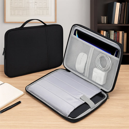 Black laptop handle sleeve bag with compartments on a wooden surface