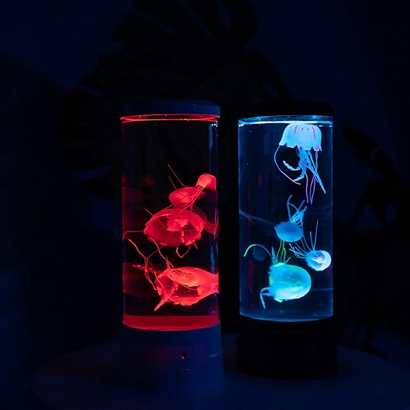 Two cylindrical containers with glowing jellyfish inside on a dark background