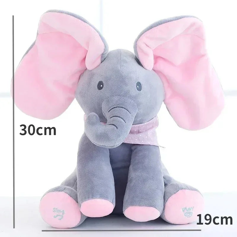 Plush elephant toy with pink ears and feet, showing dimensions on a white background