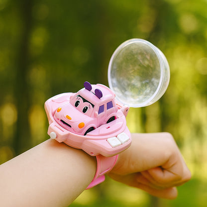 Pink toy car with a magnifying glass on a wrist against a green blurred background