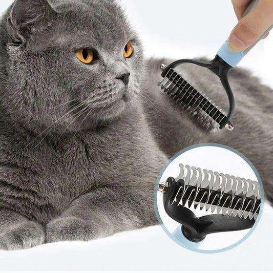 Gray cat being groomed with a pet grooming comb on a white background