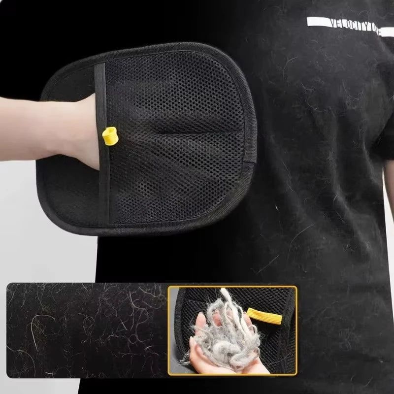 Black mesh glove with yellow button held by a person, inset showing yarn.