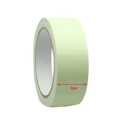Roll of green tape with a measurement label on a white background