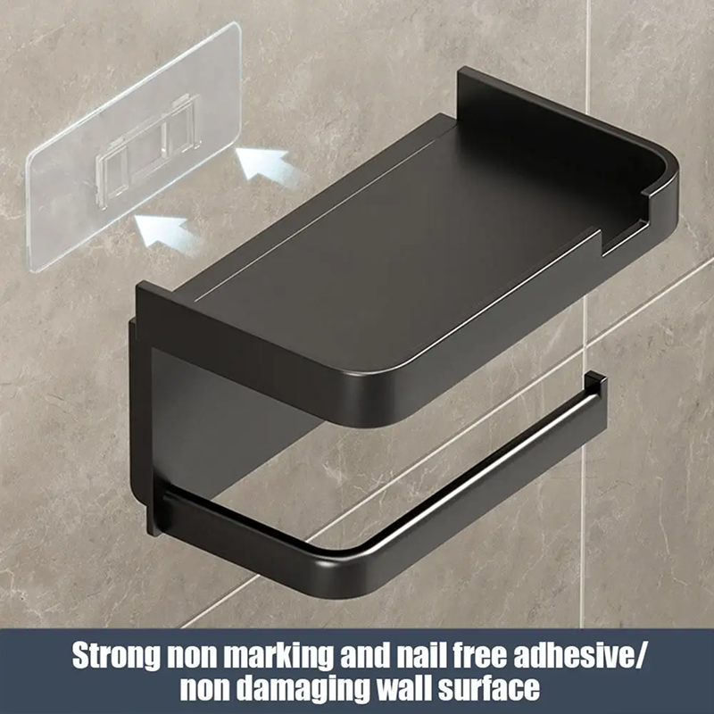 Black bathroom shelf with adhesive backing on a tiled wall
