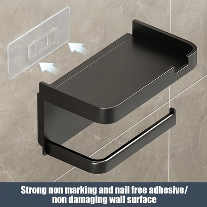 Black bathroom shelf with adhesive backing on a tiled wall