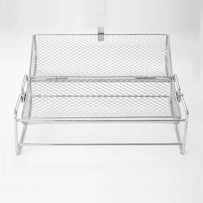 Metal mesh grill basket on a white background