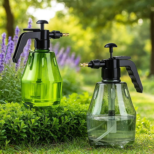 Two garden spray bottles, one green and one clear, on a grassy background.